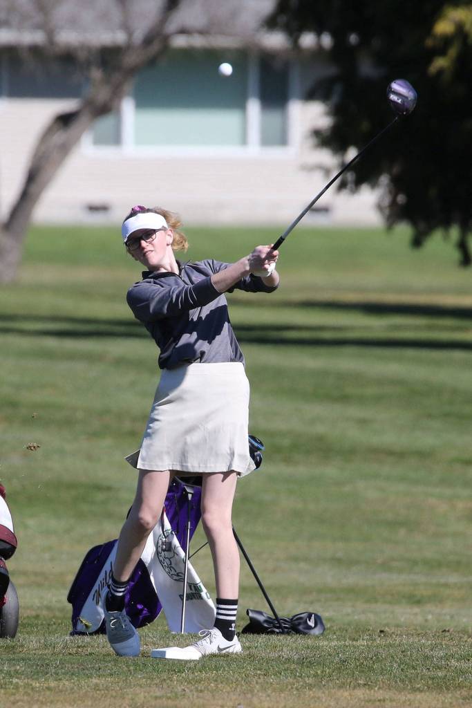 Sara Rhodes tees off Tuesday at the Whidbey Shootout.(Photo by John Fisken)