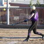 Madisyn Erbe puts the ball in play for the Wildcats.(Photo by John Fisken)