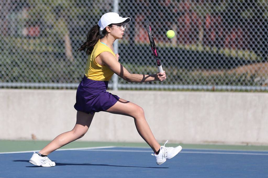 Caitlin Dennen slaps a shot in third doubles.(Photo by John Fisken)