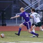 Oak Harbors William Dylander, left, beats Shorecrests Joey Wycoff to the ball. (Photo by John Fisken)