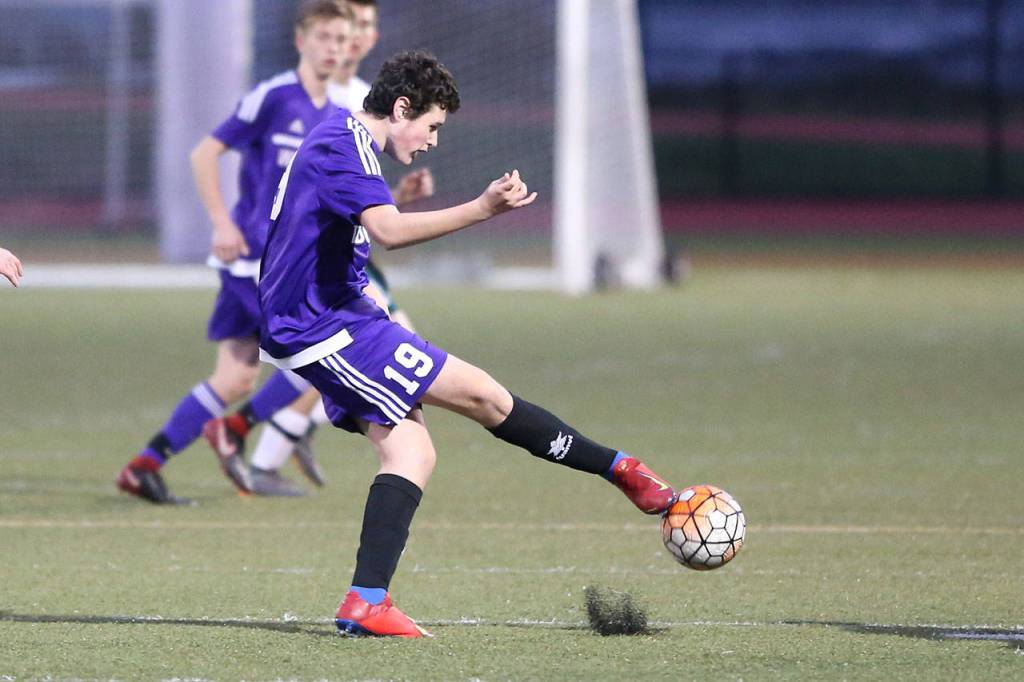 Alberto Hernandez takes control for Oak Harbor in the Shorecrest match.(Photo by John Fisken)