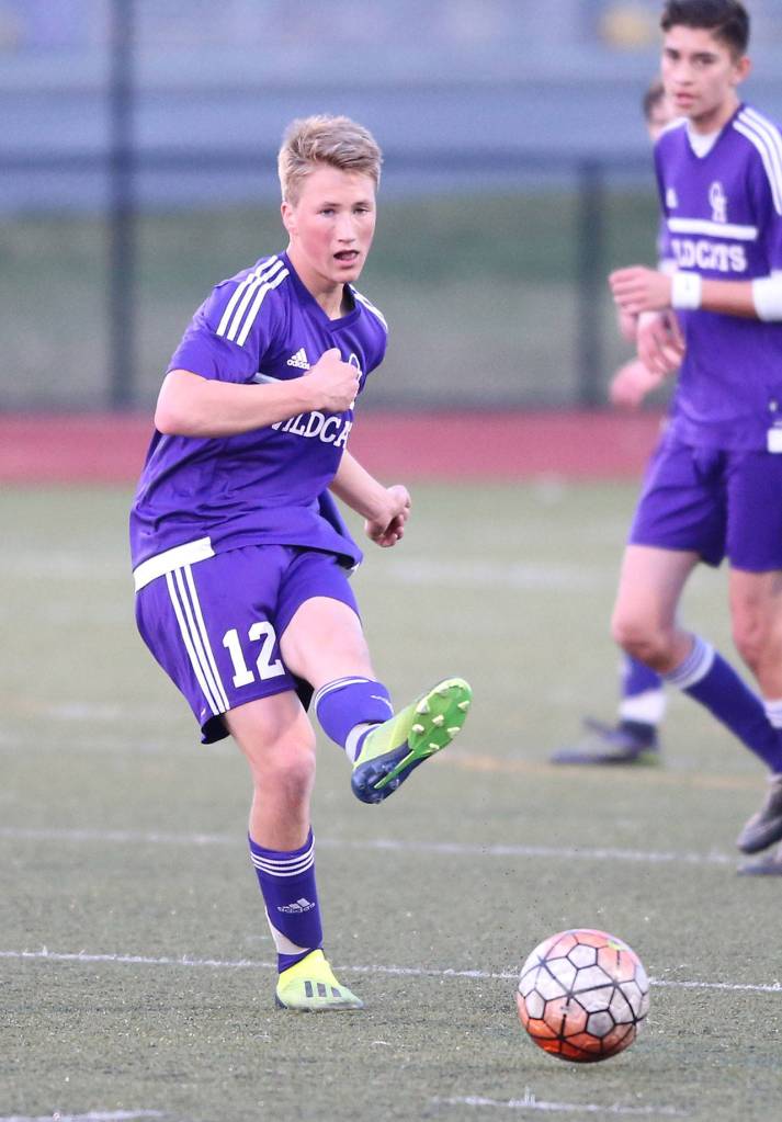 Mason Rhodes advances the ball for the Wildcats against Getchell.(Photo by John Fisken)