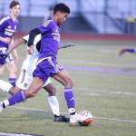 Taiveyon Shaw hustles the ball up the field against Getchell.(Photo by John Fisken)