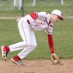 Coupeville second baseman Daniel Olson scoops up a grounder.(Photo by John Fisken)
