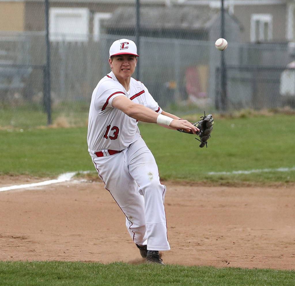 Third baseman Jake Pease fires across the diamond.(Photo by John Fisken)