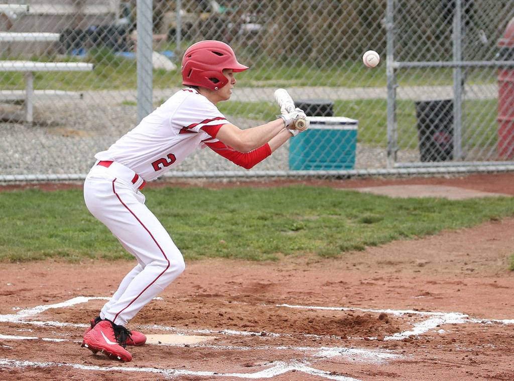 Hawthorne Wolfe puts down a bunt for Coupeville.(Photo by John Fisken)