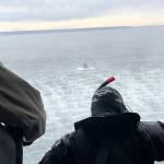Navy photo                                A search and rescue team from Naval Air Station Whidbey Island save a boater off Possession Point.