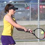 Oak Harbors Olivia Lerch shoots a backhand in the first doubles match with Shorewood.(Photo by John Fisken)