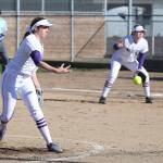 Cierra LeGendre, left, throws a pitch while Oak Harbor first baseman Kait Scheer prepares to play defense.(Photo by John Fisken)