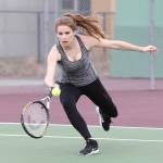 Coupevilles Emily Fielder hustles to return a shot in Wednesdays match with Kings. (Photo by John Fisken)