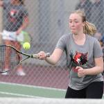 Jillian Mayne volleys in Wednesdays match.(Photo by John Fisken)