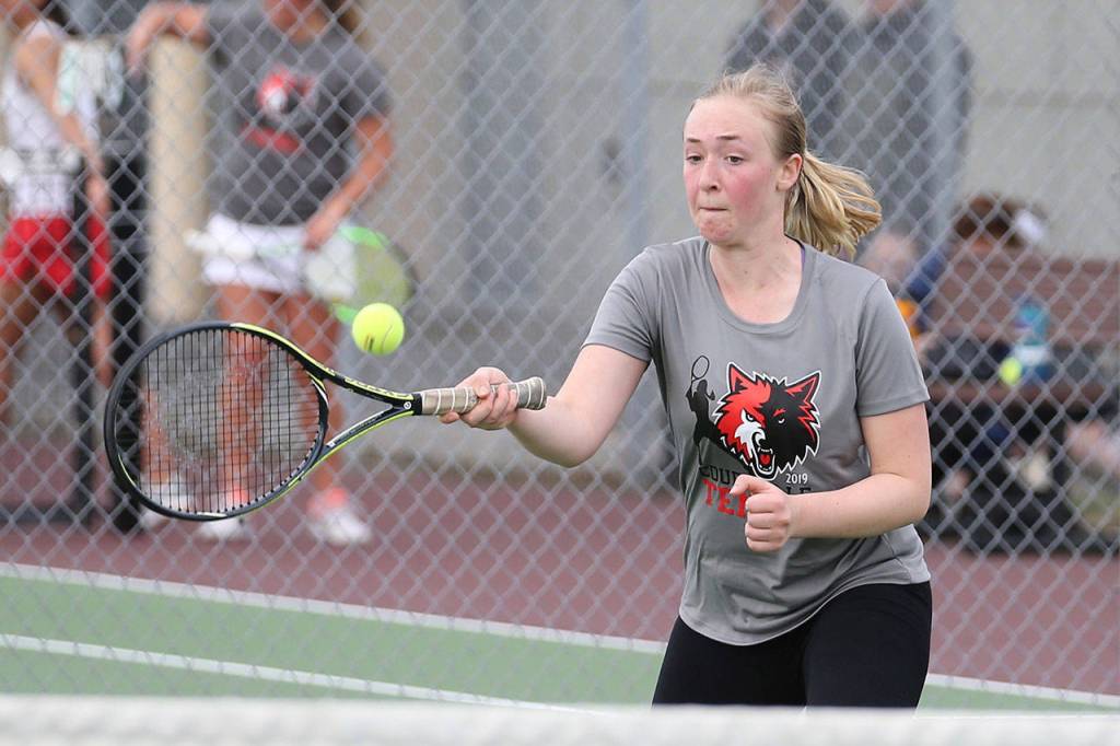 Jillian Mayne volleys in Wednesdays match.(Photo by John Fisken)