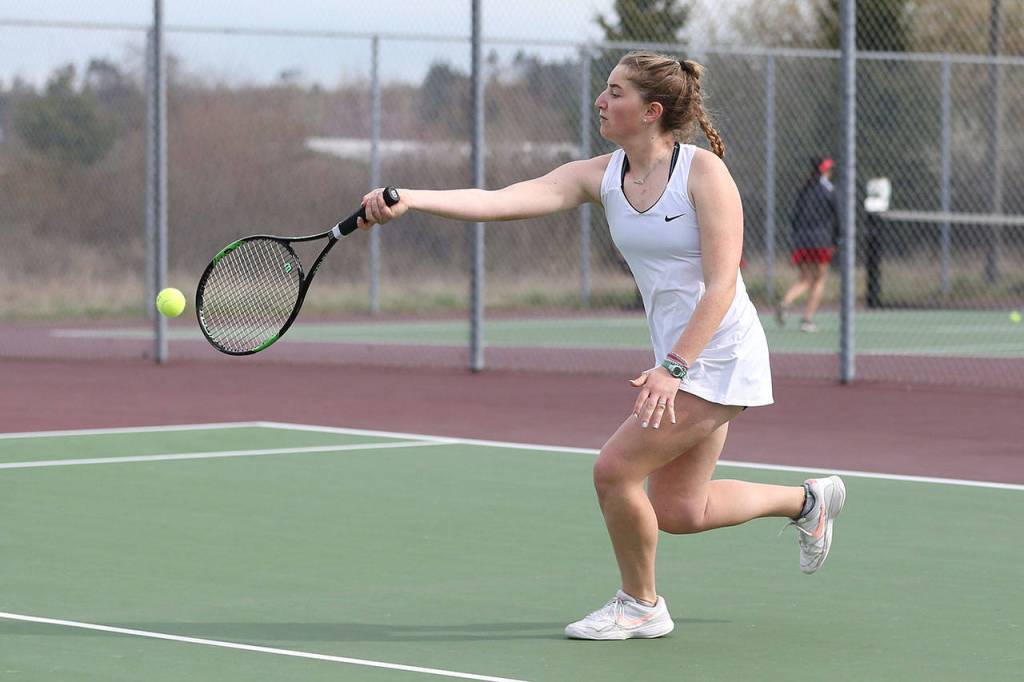 Tia Wurzrainer flips a shot in first doubles.(Photo by John Fisken)