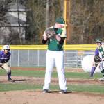 Oak Harbors Donny Kloewer, left, leads off first base Tuesday.(Photo by John Fisken)