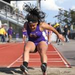 Tiana Jackson sticks the landing in the long jump.(Photo by John Fisken)