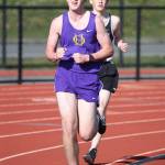 Luke Turner runs the 1,600 in Thursdays meet.(Photo by John Fisken)
