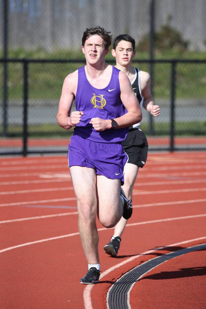 Luke Turner runs the 1,600 in Thursdays meet.(Photo by John Fisken)