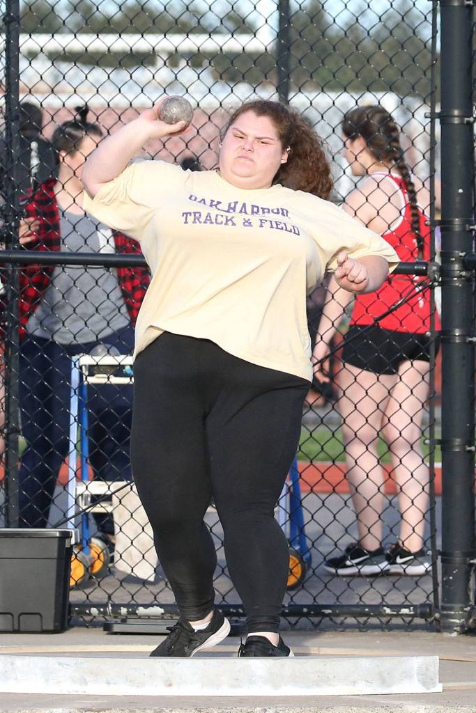 Sarah Ulam puts the shot to first place.(Photo by John Fisken)