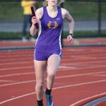 Courtney VanGiesen runs a leg in the 4x400 relay.(Photo by John Fisken)
