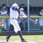 Above, Taylor Rummel drives a pitch over the right field fence for a home run. Below, he follows through on the home run swing and then is greeted at home plate by Donny Kloewer, left, and his Oak Harbor teammates.(Photos by John Fisken)