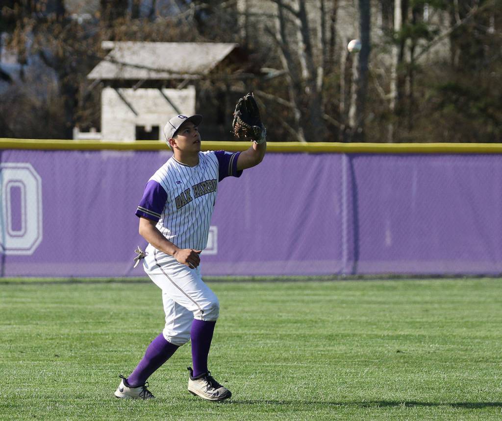 Left fielder Aaron Martinez settles under a fly ball.(Photo by John Fisken)