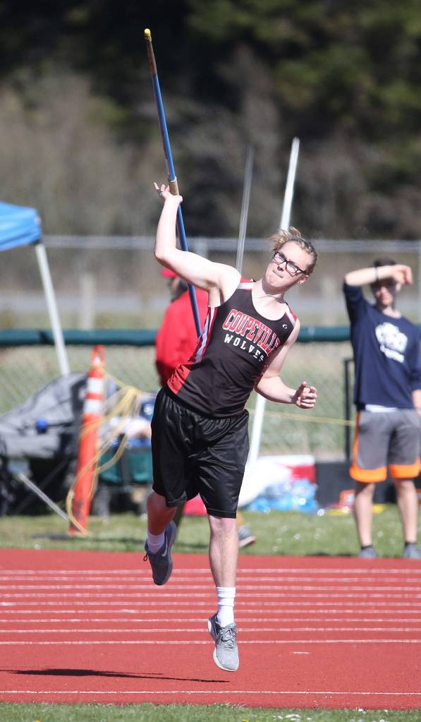 Brian Casey lets the javelin fly.(Photo by John Fisken)