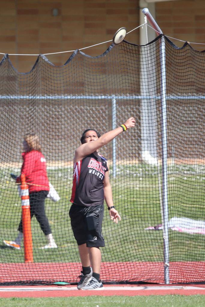 Elijah Okaruru flings the discus Saturday.(Photo by John Fisken)