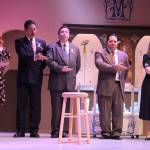 At the high-end store, Maraczeks Parfumerie, customers are greeted with a line-up of serenading sales clerks played by Emily Hoyt, left, Douglas Langrock, Andrew Huggins, Karl Borja and Katherine Lof. (Photo by Patricia Guthrie/Whidbey News Group)