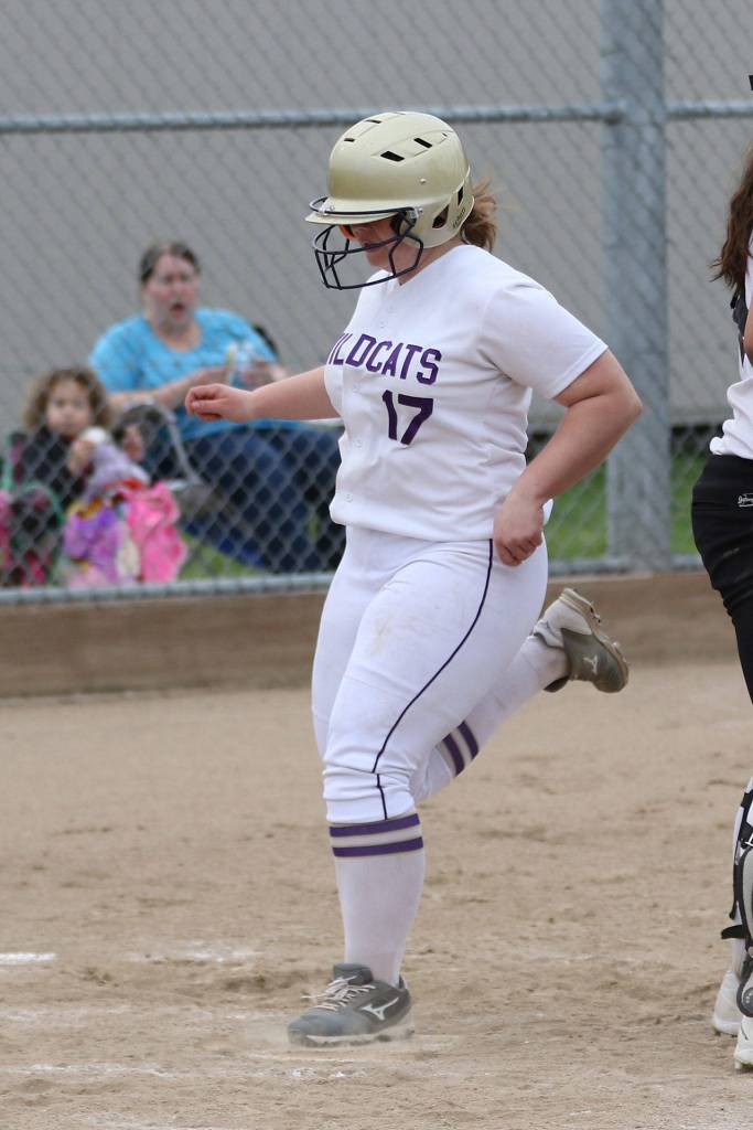 Eleanor Tucker scores a run after doubling for Oak Harbor.(Photo by John Fisken)
