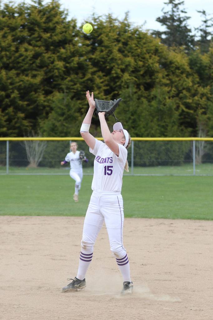 First baseman Kait Scheer settles under a pop-up.(Photo by John Fisken)