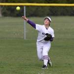 Oak Harbor outfielder Rinka Tsutsumi tries to gun down a base runner.(Photo by John Fisken)