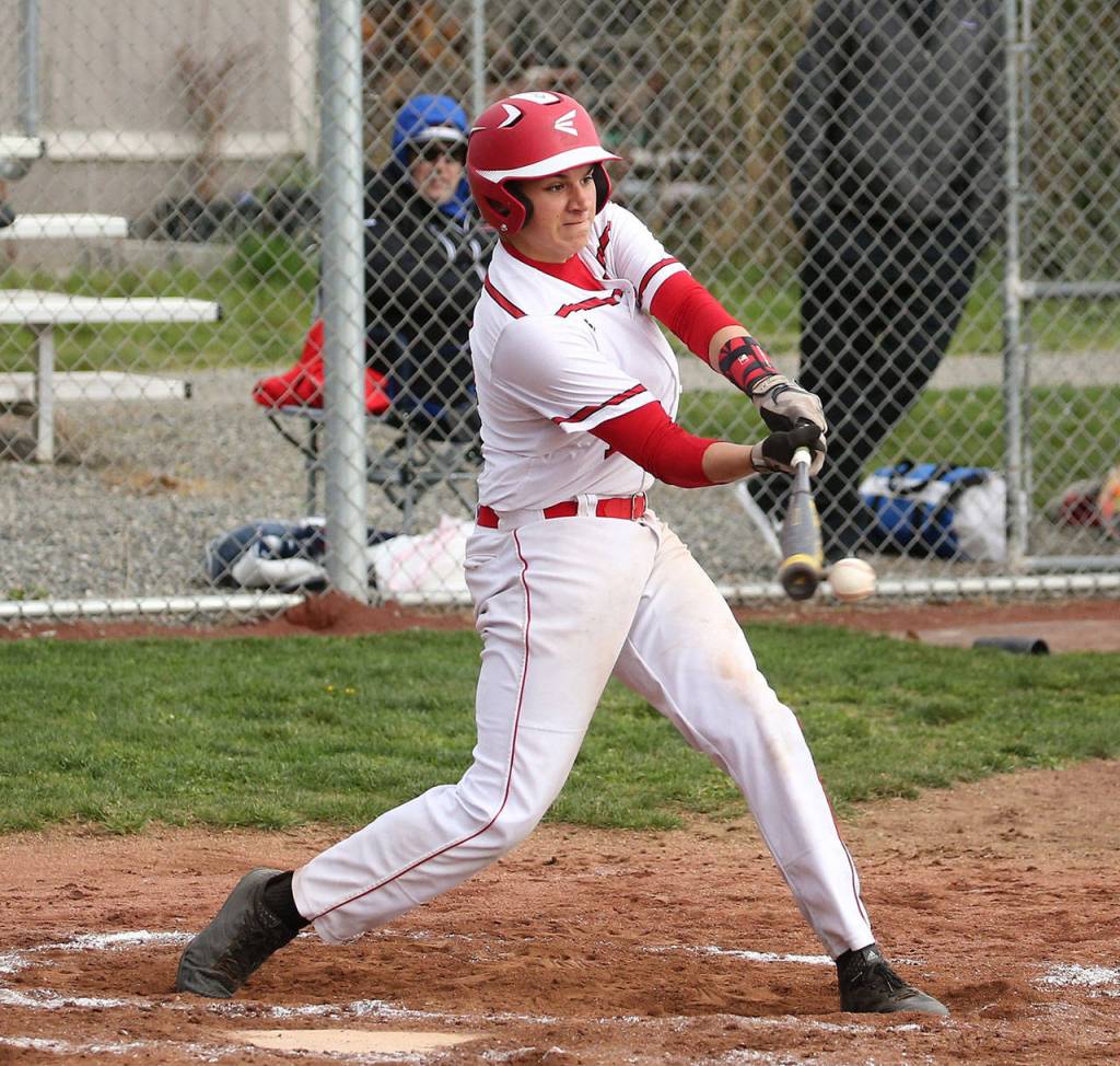 Jake Pease makes contact.(Photo by John Fisken)