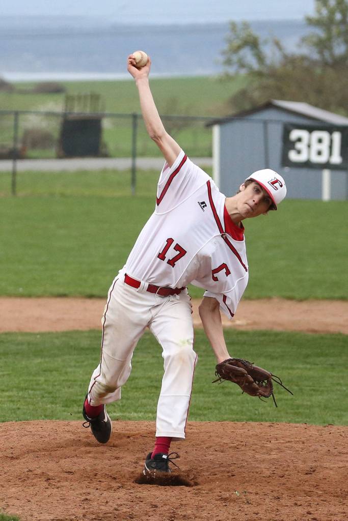 Cody Roberts throws in relief for the Wolves.(Photo by John Fisken)