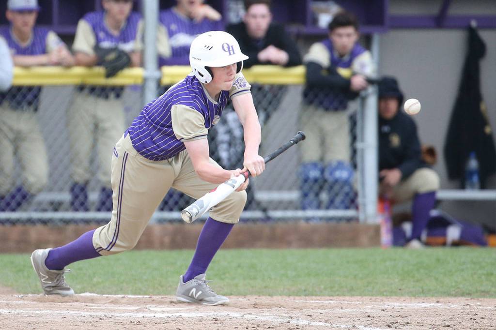 Noah Meffert drops down a bunt in Tuesdays game.(Photo by John Fisken)