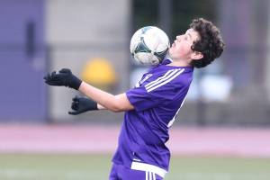 Wildcats put up battle but lose to Spartans / Soccer