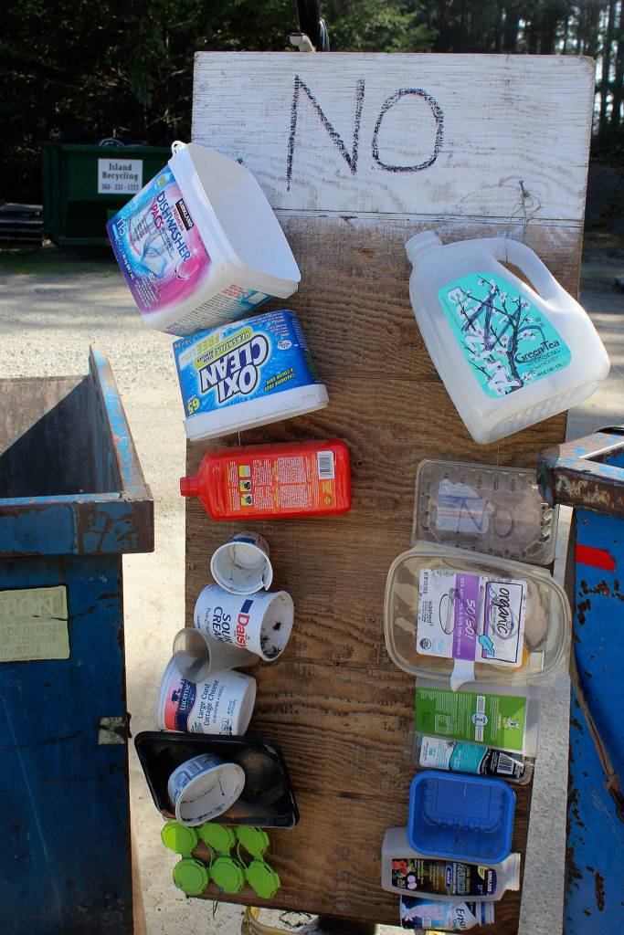 <em>Like all the recycling hubs on Whidbey, only plastic containers marked No. 1 and No. 2 are being accepted. Items continue to be added to this banned signed at Coupevilles Island Recycling center. </em>