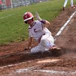 Gavin Knoblich scores a run for the Wolves.(Photo by Karen Carlson)
