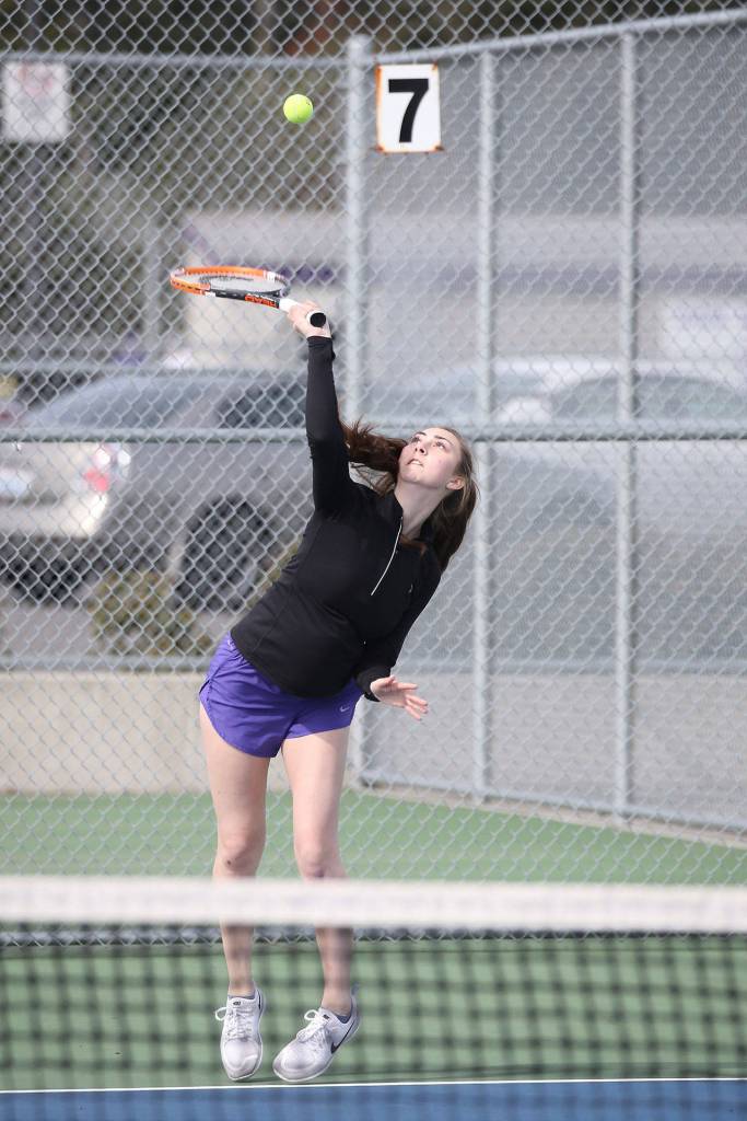 Emily Gouge gets ready to launch a serve against Snohomish.(Photo by John Fisken)