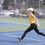Oak Harbors Danielle Lonborg runs down a shot in her fourth singles match with Snohomish on Monday.(Photo by John Fisken)
