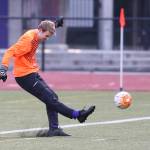 Oak Harbor keeper Maxwell Brighton boots a goal kick in Tuesdays match with Marysville-Pilchuck. (Photo by John Fisken)