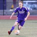 Nathan Merrill advances the ball for the Wildcats.(Photo by John Fisken)