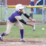 Oak Harbors Caleb Fitzgerald attempts to put down a bunt.(Photo by John Fisken)
