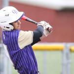 Gage McLeod singles for the Wildcats.(Photo by John Fisken)