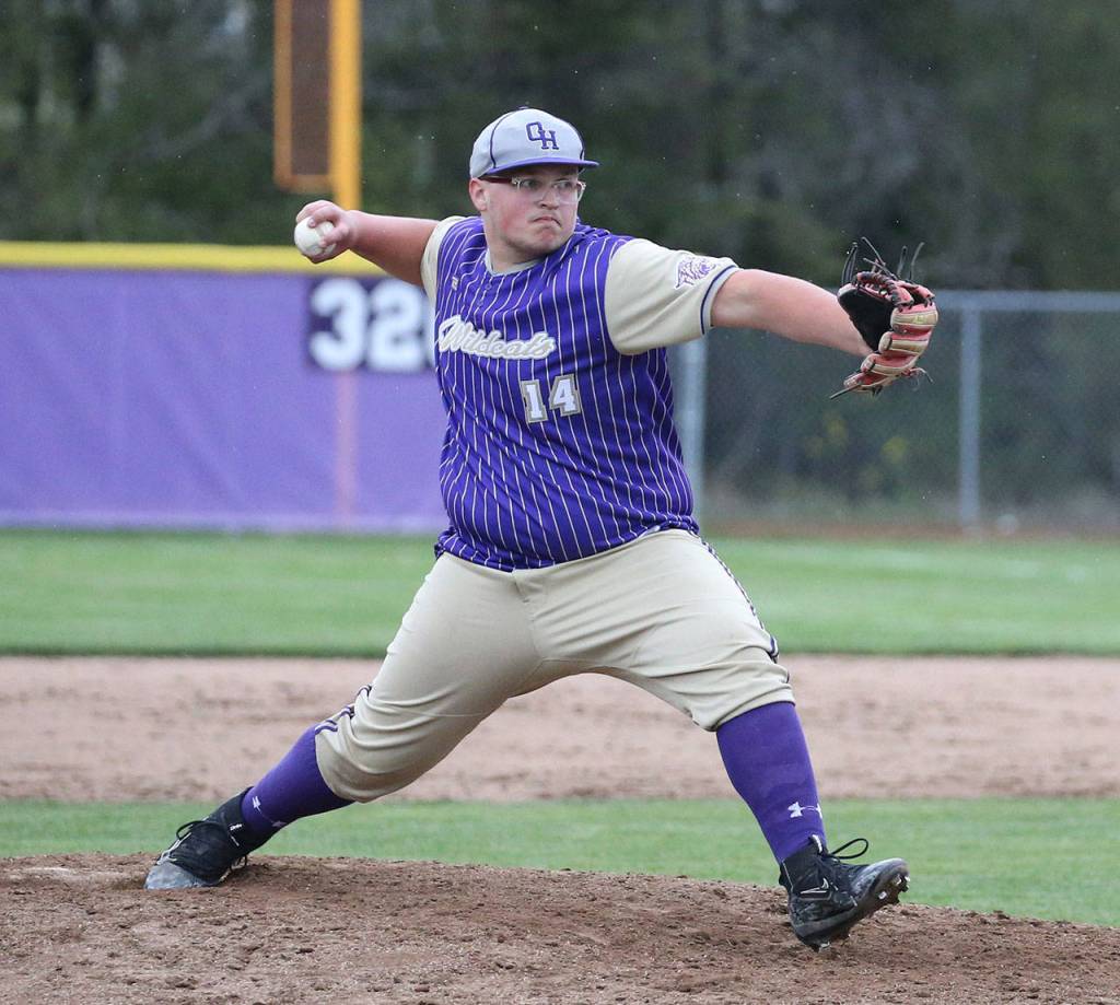 Noah Miller closes out the seventh inning for Oak Harbor.(Photo by John Fisken)