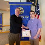 Photo provided.                                Todd Krantz presents Matthew Rosencrans with his certificate.