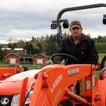 Photos by Maria Matson/ Whidbey News Group.                                Mark Stewarts tractor has come in handy for Boots to Roots. Hes tilled the soil twice so far, and will do so one more time.