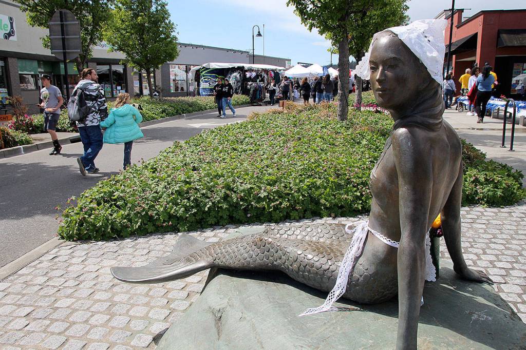 The downtown Oak Harbor mermaid was dressed up Dutch-style for the Holland Happening street fair, which included more than 70 vendors.