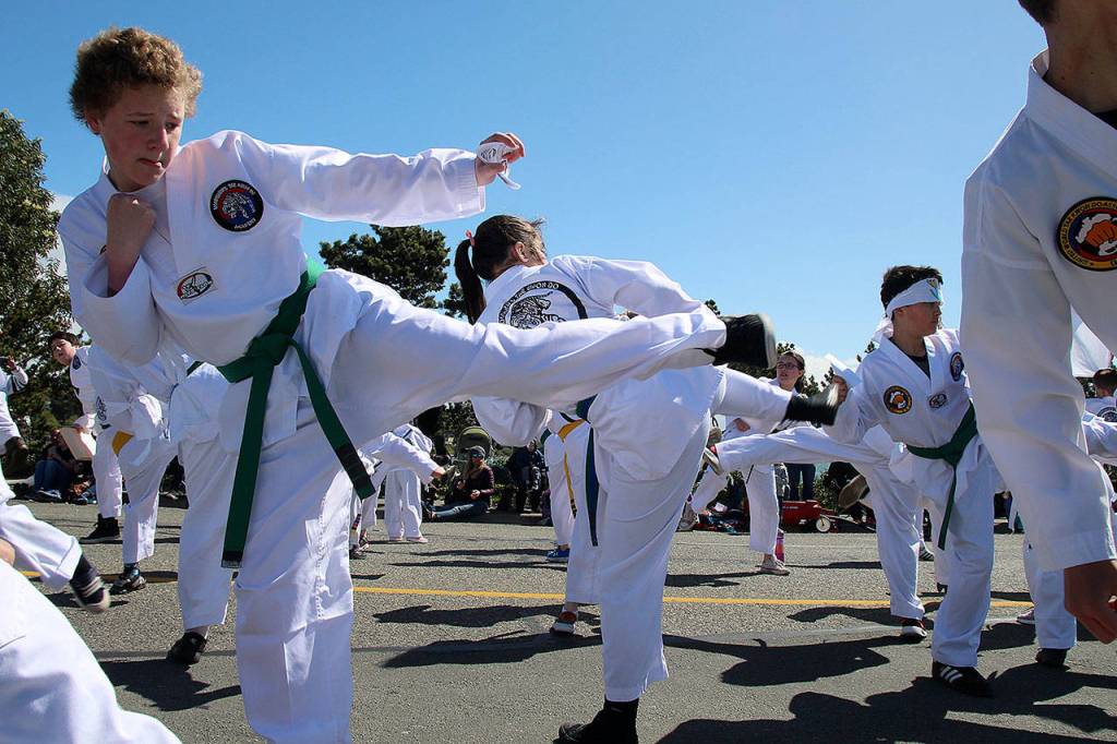 A student of Woodwards Tae Kwon Do Academy demonstrates his kick.