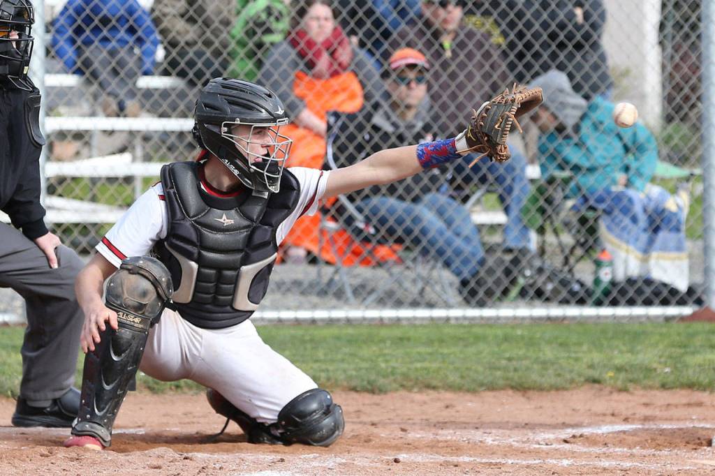 Coupeville catcher Gavin Knoblich receives a pitch.(Photo by John Fisken)