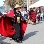 (Photo by Maria Matson/Whidbey News-Times)                                The Tsimshian Haayuuk Dancers weave and spin in a dance at the center of a captivated crowd at the Penn Cove Water Festival. A speaker discussed the symbolism of their cultural garb and spoke of the significance of the traditional dance